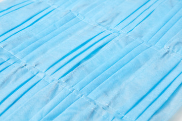 Obraz premium Creative backdrop from protective medical masks. Top view.