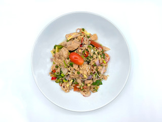 Tuna salad, Thai cuisine, sprinkled with vegetables such as spring onions, red peppers, tomatoes, herbs and many kinds vegetables Has a pleasant aroma. Isolated on white background with clipping path.