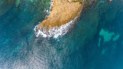 Aerial, landscape of waves of the Pacific Atlantic Ocean, which are washed by rocky shores. Portugal.