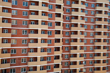 Fototapeta na wymiar Unfinished high-rise apartment building.