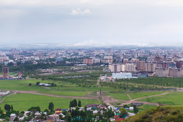View of the city from the mountain. Summer landscape. Kyrgyzstan, Bishkek
