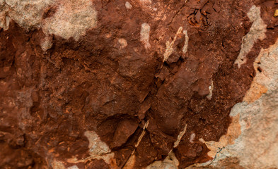 Red brown granite. Granite rocks. Rusted background. Colorful Rock background