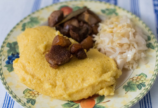 Delicious unhealthy fried pork greaves in the pan traditional Romanian Christmas dish. Jumari