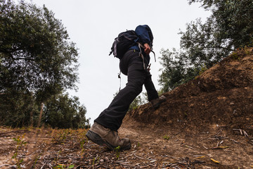 Naklejka premium Young man hiking.