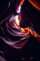 Image in low key with colorful Antelope Canyon in Page Arizona