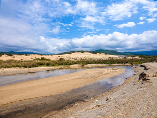 The wonderful oasis of Piscinas, with imposing and sinuous dunes of fine, warm golden sand, considered amongst the most beautiful in the world