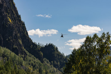 takeoff and landing helicopter in the mountains