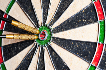sharpshooter throw darts right into the center of aim. Competition and winning. Perfect hit
