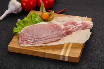 Raw pork bacon