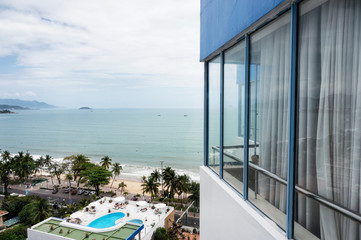 Glass windows transparent on hotel with tropical sea