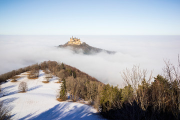 Hohenzollern Castle rises from the haze