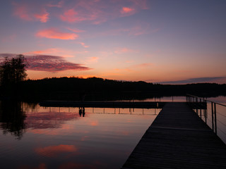 Fototapeta premium Amazing sunset, with beautiful sky reflections in the water of Hancza lake. Suwalski landscape park, Podlaskie, Poland