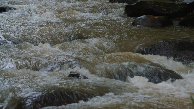 a mountain river rushing downhill