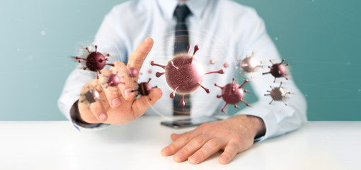 Businessman holding a Group of red virus cell - 3d rendering