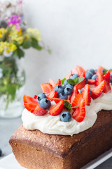 Summer dessert,  berry cake with cream cheese frosting