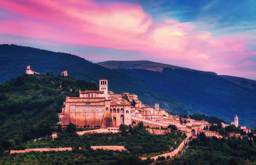 Panoramic views of the magnificent sunset city of Assisi in the Umbria region of Italy.
