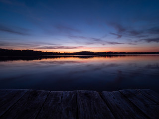 Amazing sunset, with beautiful sky reflections in the water of Hancza lake. Suwalski landscape park, Podlaskie, Poland