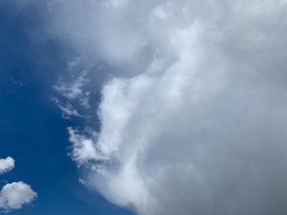 Large white cloud on the blue sky background