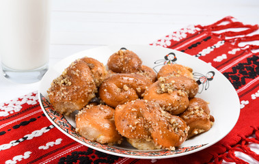 Concept of romanian cuisine. Homemade Mucenici, traditional desserts made in the figure 8