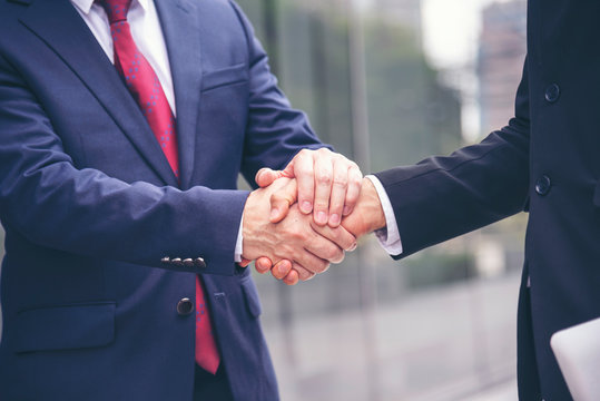 Trust Promise Concept. Honest Lawyer Partner with Professional Team make Law Business Agreement after Complete Deal. Ethics Business people handshake, touch and Respect customer to trust partnership.