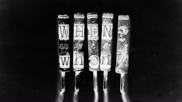 what where  when why who how ? text  with old typewriter hammers  macro