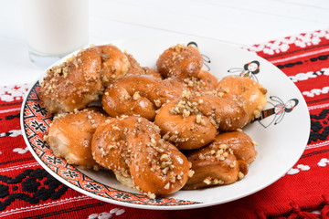 Concept of romanian cuisine. Homemade Mucenici, traditional desserts made in the figure 8