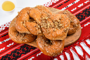 Concept of romanian cuisine. Homemade Mucenici, traditional desserts made in the figure 8