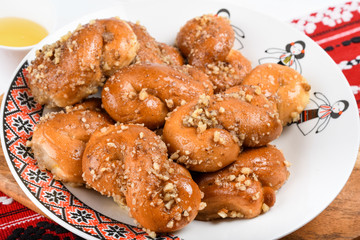 Concept of romanian cuisine. Homemade Mucenici, traditional desserts made in the figure 8