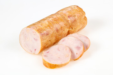 Tasty meat sausages over white background