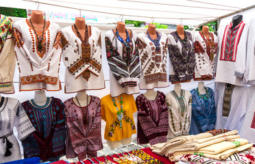 The Ukrainian embroidered shirts, national handmade clothes are on sale with different decorations