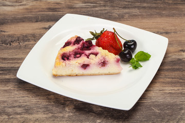 Cheesecake with cherry served strawberry