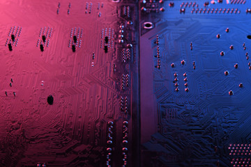 Abstract electronic circuit board, computer motherboard lines and components, beautiful red and blue color