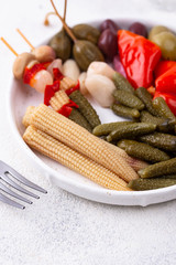 Assortment of marinated or pickled vegetable.