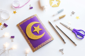 Diy Ramadan kareem card with golden crescent moon and a star. Gift idea, decor Ramadan kareem.