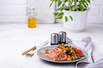 Baked salmon with boiled vegetable