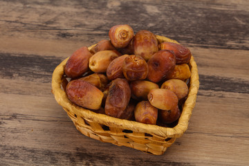 Sweet tasty dry dates in the basket