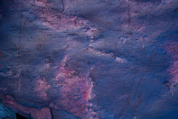Dark blue and pink stone texture. Abstract natural pattern. Surface for design. Textured background...