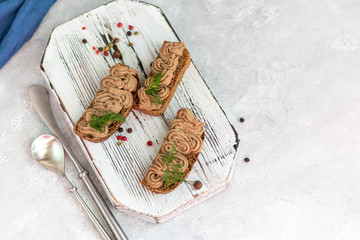 Fresh homemade chicken liver pate with carrots, onions and butter. Garnished with a sprig of dill....