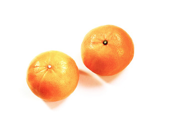 Orange fruits and oranges with half isolated on the white background.