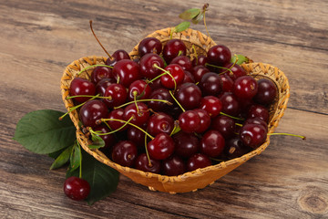Sweet ripe cherry with leaves