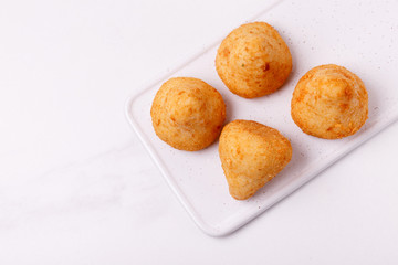 sicilian arancini di riso. risotto rice balls. Coxinha of chicken, Brazilian