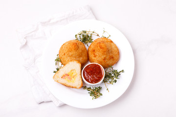 sicilian arancini di riso. risotto rice balls. Coxinha of chicken, Brazilian