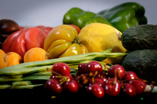 Fruit presentation with various colorful fresh fruits and vegetables