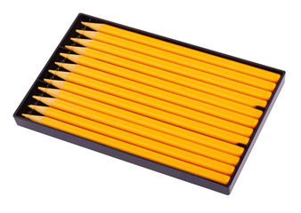 New yellow wooden pencils in black plastic box tin isolated on white background with clipping path