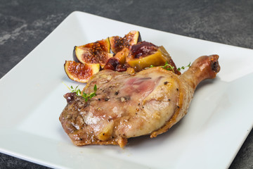 Roasted. duck. leg with plum and apple
