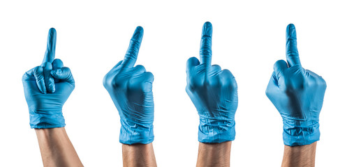 Varias manos con guantes de látex haciendo un gesto grosero.