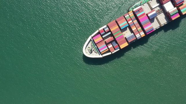 Container ship from abroad About import and export business logistic and supply chain Aerial view