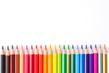 Fototapeta premium Colored pencils on a white background