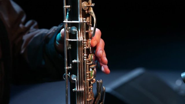 musician playing bassoon, wind instrument, slider shot