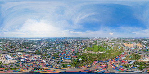 360 panorama by 180 degrees angle seamless panorama of aerial of container cargo ship in the export...